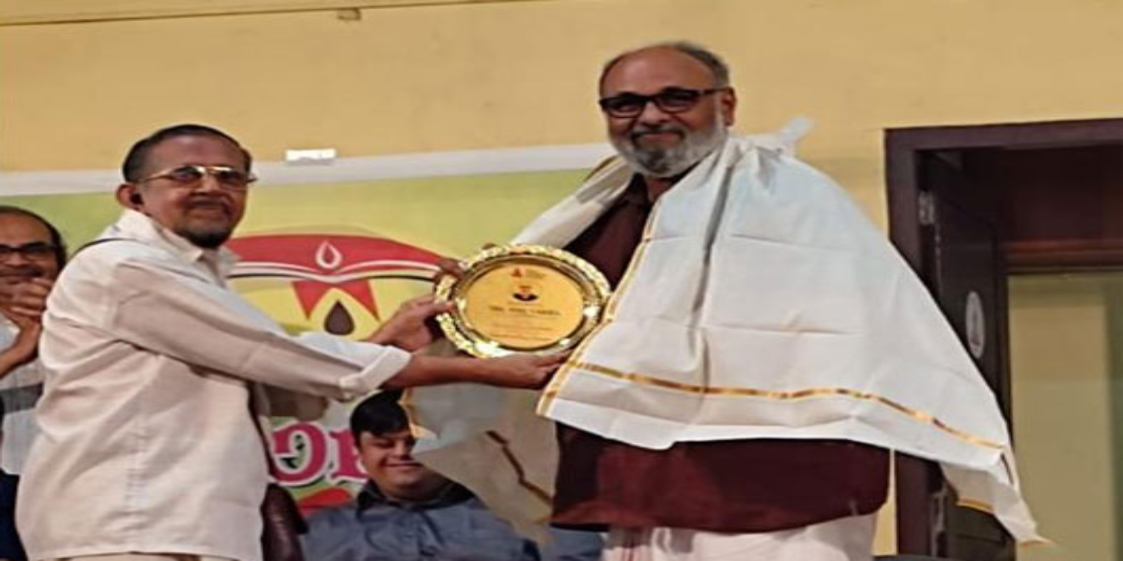 Honoured by Kochi Kshathriya Samajam for the meritorious services in building homes