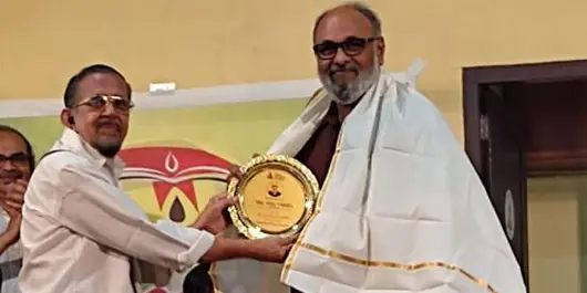 Honoured by Kochi Kshathriya Samajam for the meritorious services in building homes