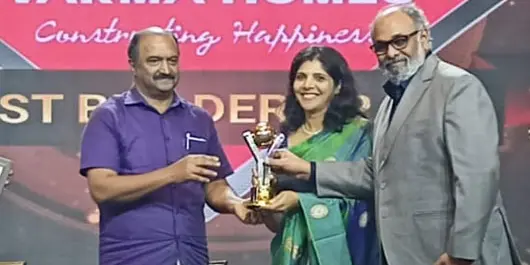 Receiving the Best Builder Brand Award 2022 from News 18 Kerala
