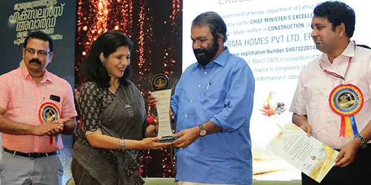 Receiving the Chief Minister's Excellence award 2023 for labour welfare