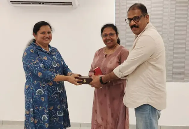 Mr. Suresh and Mrs. Ambili